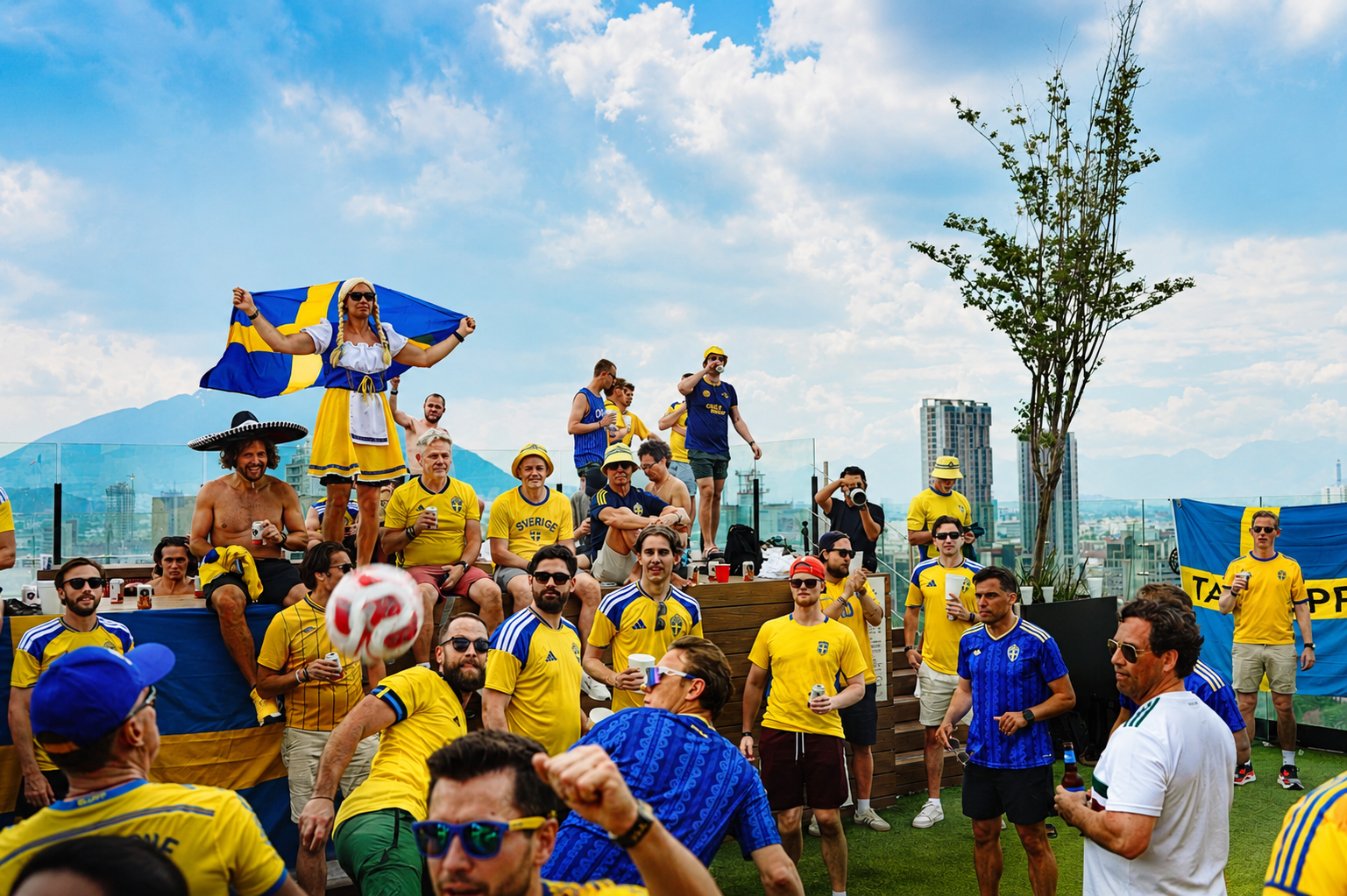 Swedish supporters gathered on a rooftop at a TILO Studios event in Monterrey