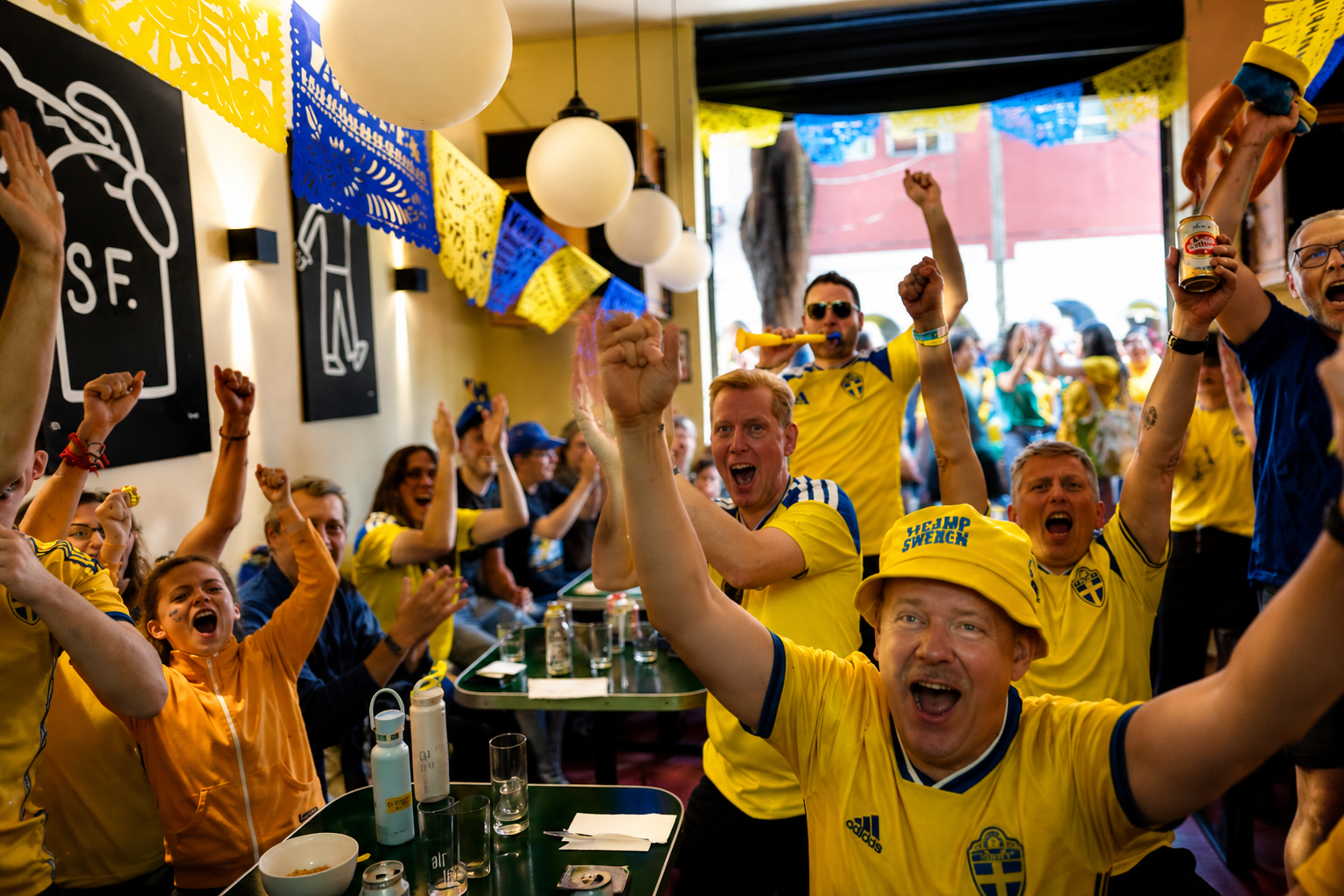 Swedish fans celebrating together at a TILO Studios watch party in Mexico City